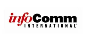 A group of people attending an InfoComm International event, showcasing technology displays and networking opportunities.